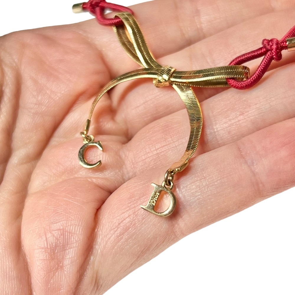 VTG AUTH Christian Dior Red Elastic Gold Chain CD Logo Bow Charm Bracelet - Picture 6 of 12
